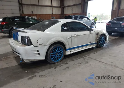 1999 Ford Mustang z USA, uszkodzony, nr VIN 1FAFP4043XF147281